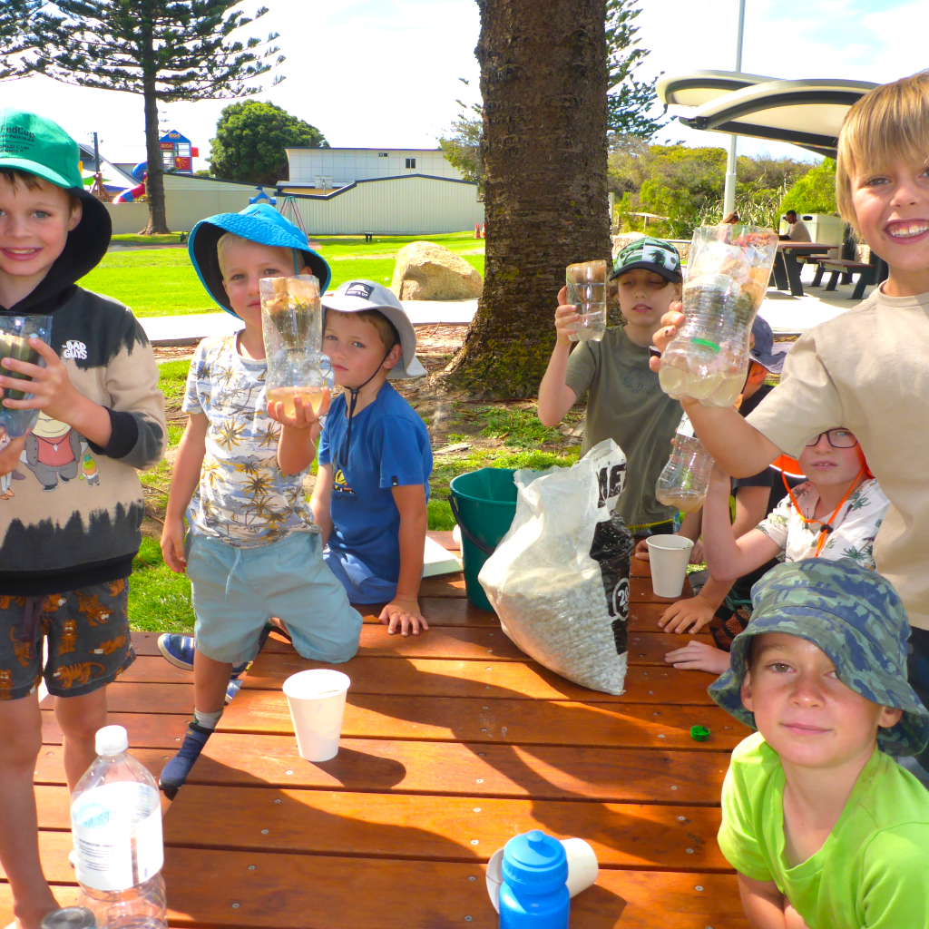 Kids Adventure Club making water filters